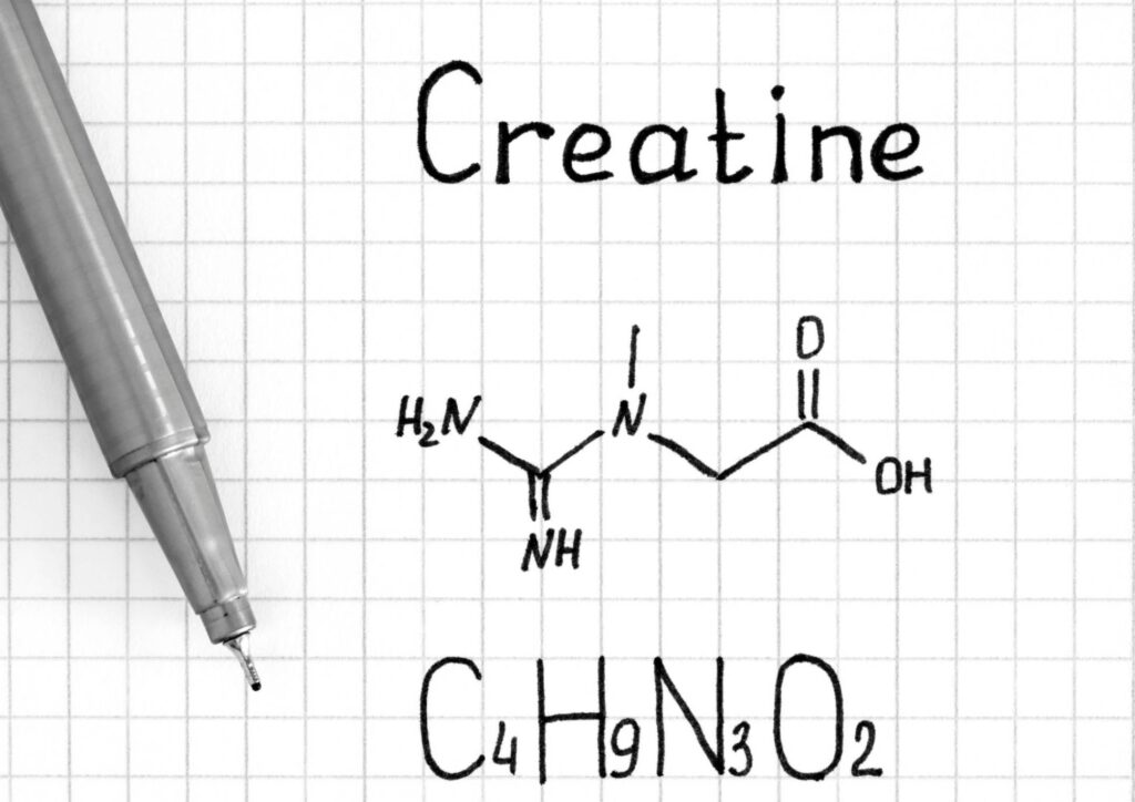 Is Creatine Good for Weight Loss? 7 A close-up of a notebook featuring a detailed illustration of a creatine molecule.