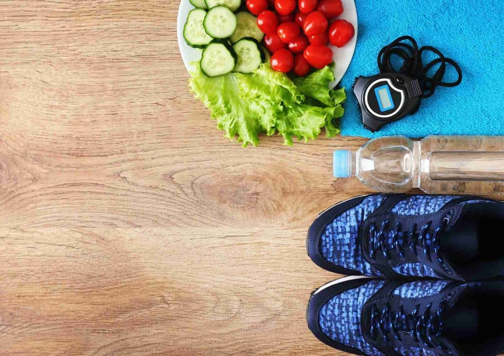 What Is a Sports Nutritionist? 5 A plate filled with several bottles of water, highlighting the importance of staying hydrated.