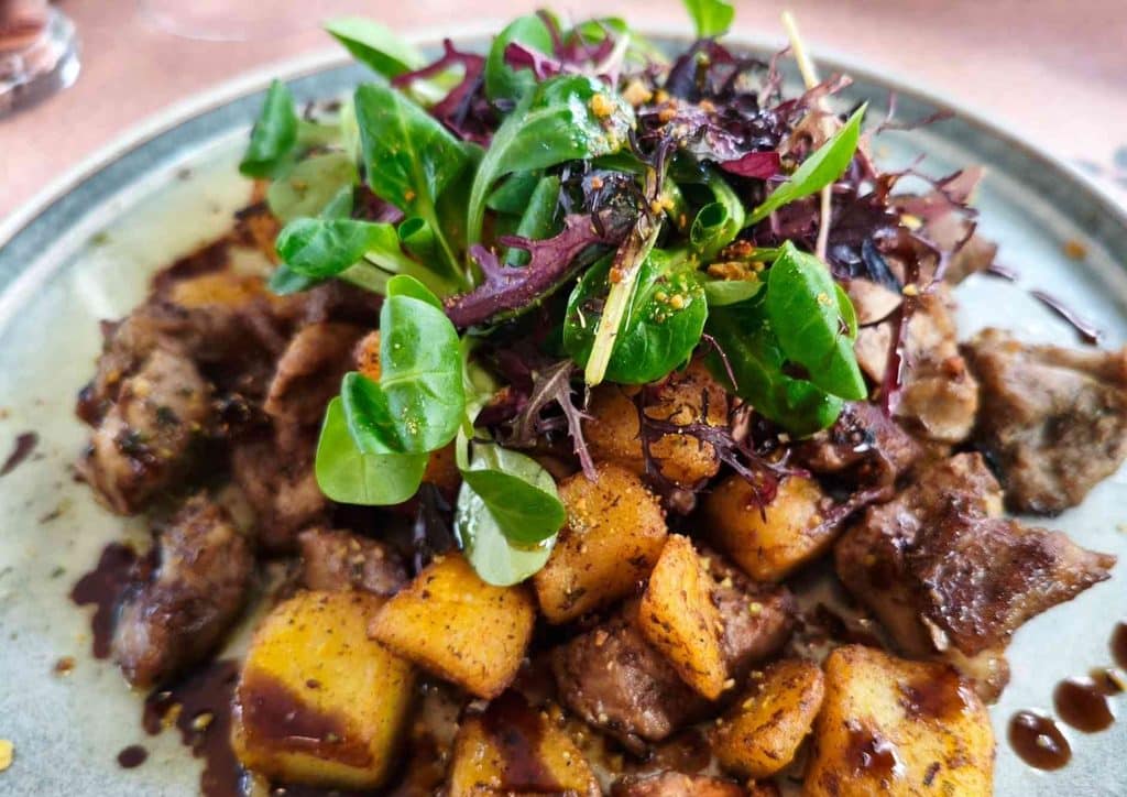Healthy Lunches for Weight Loss: Work and Home Ideas 33 A plate featuring a serving of meat, roasted potatoes, and a side of steamed greens.