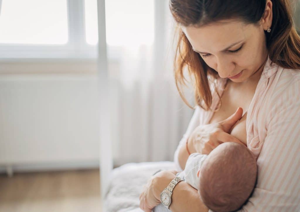 Losing Weight While Breastfeeding: What's Safe and Realistic 63 A mother breastfeeding her baby, highlighting the importance of maternal health during nursing.