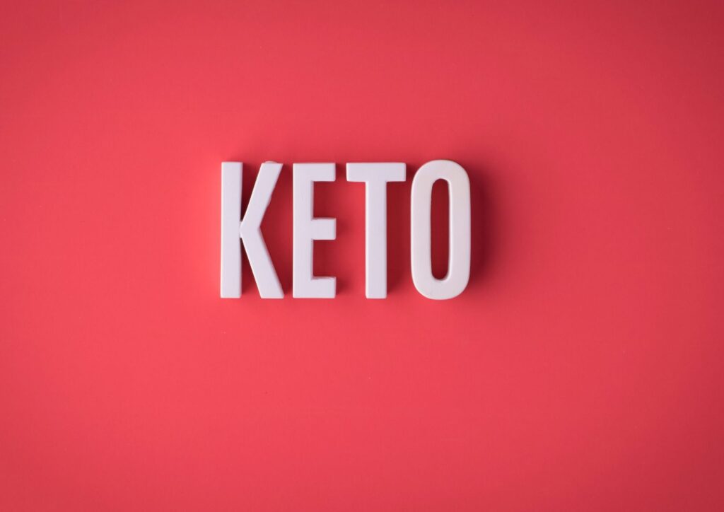 Keto vs Low Carb for Weight Loss: Which Is Better? 11 The word "keto" prominently displayed in white text on a vibrant red background.
