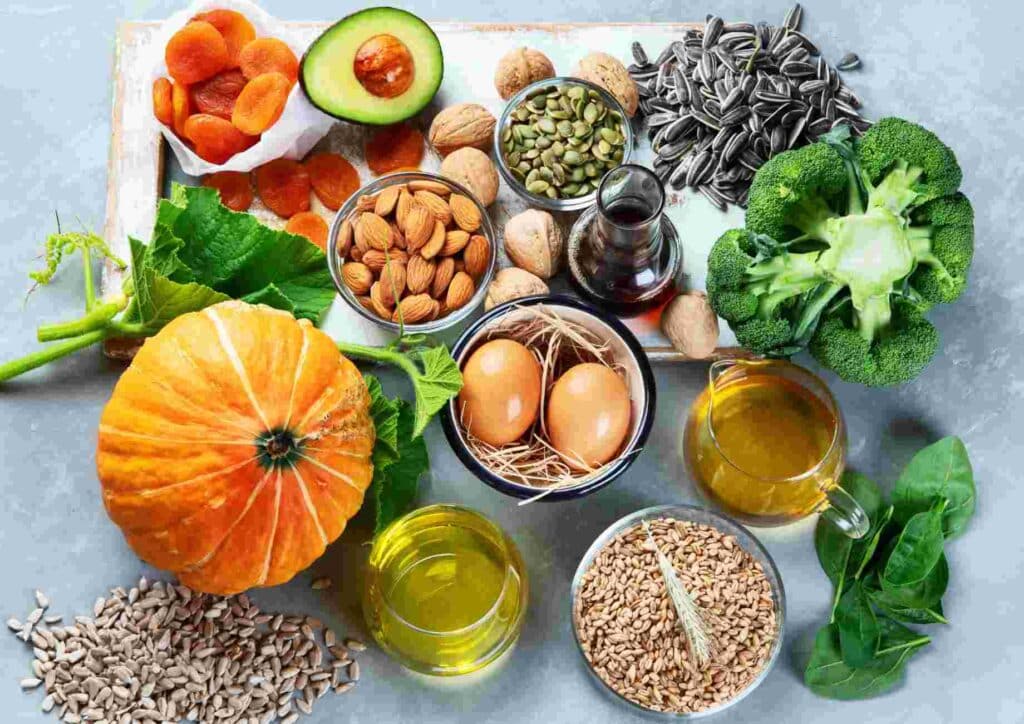 Keto vs Low Carb for Weight Loss: Which Is Better? 30 A variety of heart-healthy foods including fruits, vegetables, nuts, and whole grains displayed on a wooden table.