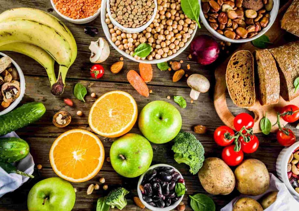 Keto vs Low Carb for Weight Loss: Which Is Better? 26 A colorful assortment of fruits and vegetables displayed in bowls, showcasing a variety of shapes and colours.