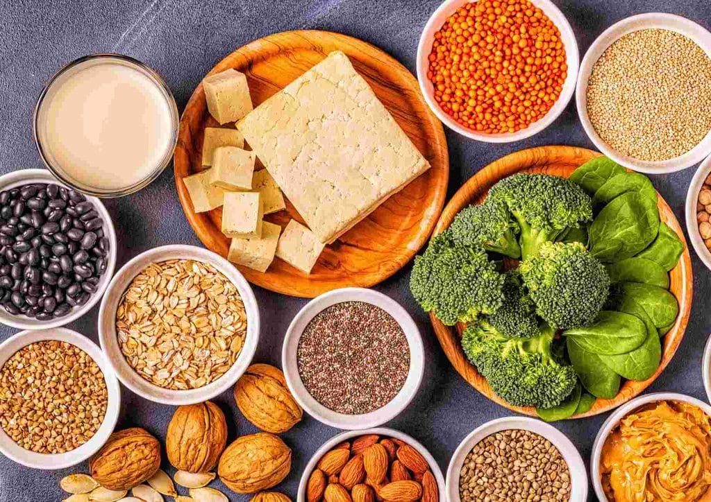 Vegetarian Diet for Weight Loss: How to Get It Right 27 An assortment of nuts, seeds, and beans displayed together, showcasing a variety of textures and colours.