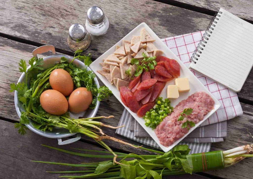 Healthy Meal Plans for Weight Loss: How to Build One That Lasts 32 A structured meal plan template displaying designated spaces for each day's meals and snacks for easy meal tracking.