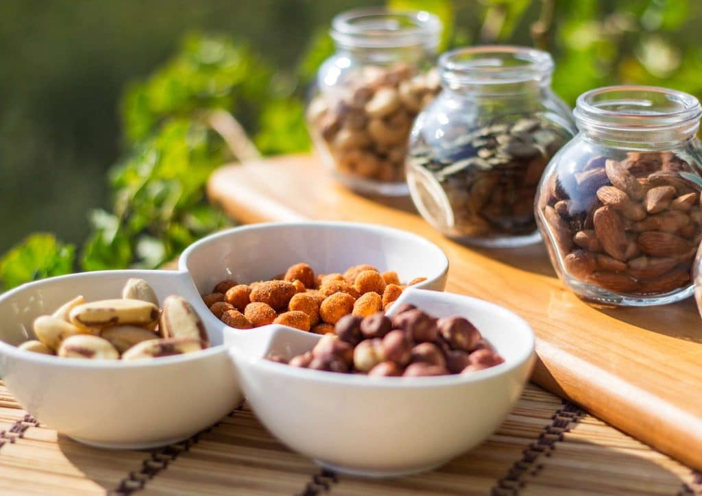 Is the Mediterranean Diet Good for Weight Loss? 9 A dining table displaying multiple bowls of food, featuring a central bowl filled with rice.