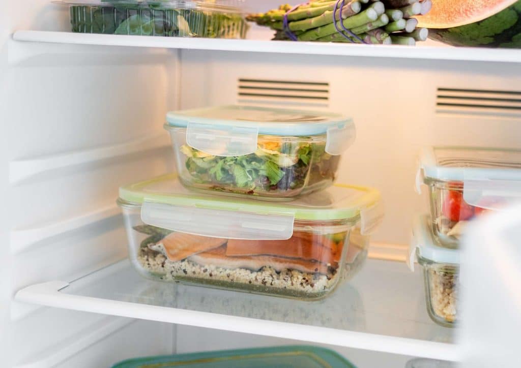 Healthy Lunches for Weight Loss: Work and Home Ideas 3 A refrigerator filled with various food items and a clear glass container on the shelf.